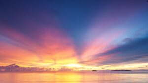 A beautiful sunset with blue, red and yellow colours over the sea.
